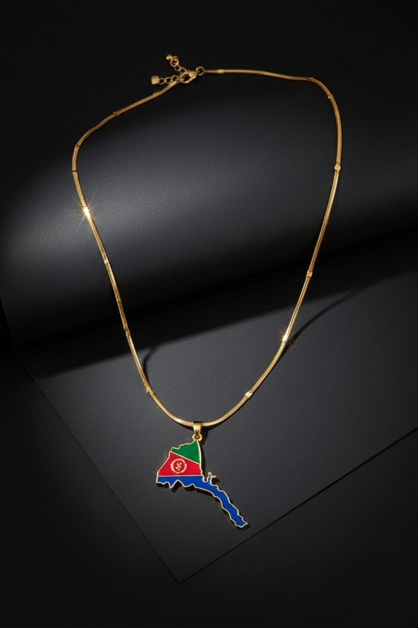 Eritrean flag and map design necklace by WELEBA featuring vibrant colors and detailed map imagery on a silver chain.